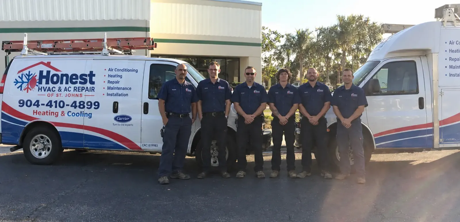 The Honest HVAC & AC Repair of St. Johns team with their service vans
